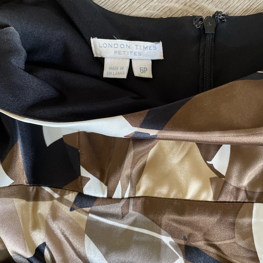 Dress is great for the special occasions or office, pleated, fitted, & lined.